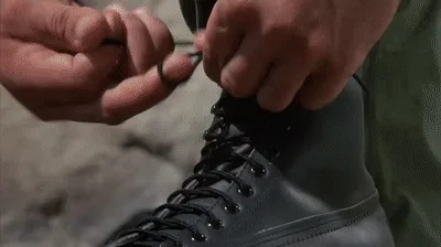 A six-panel image collage from the movie 'The Terminator' showing close-ups of hands performing various actions: tying a…