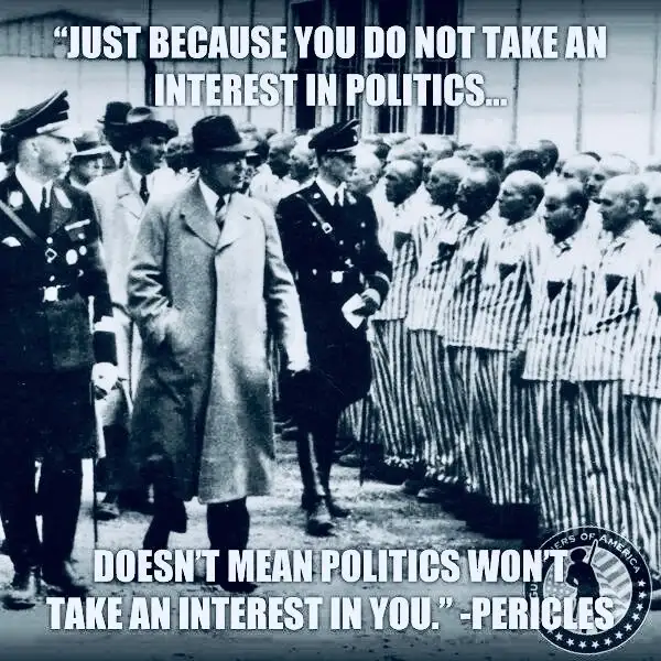A black-and-white historical photograph shows a man in a trench coat walking past a line of men in striped prison uniforms…