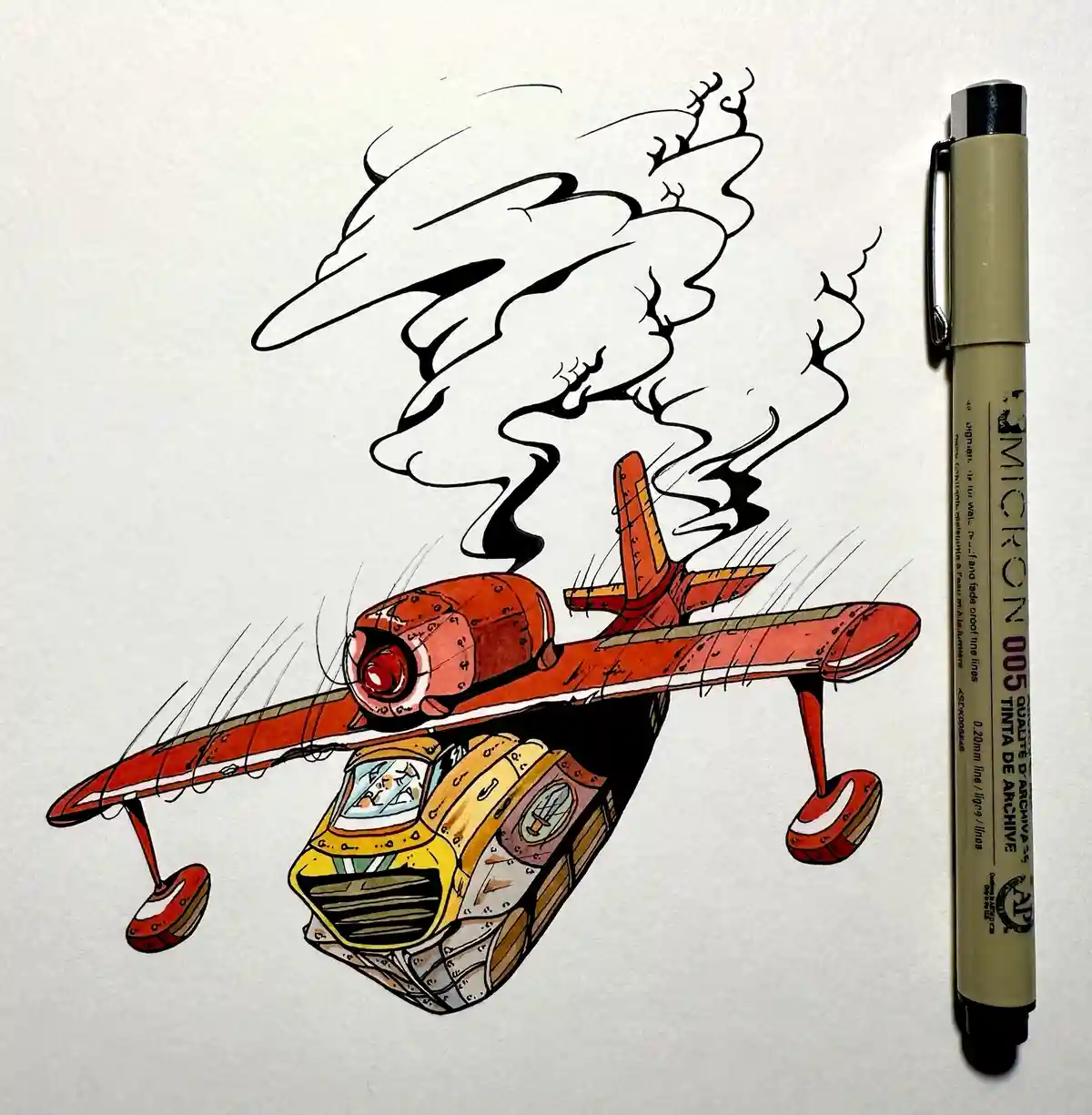 A hand-drawn illustration on paper shows a cartoonish red airplane with a yellow, boxy vehicle strapped underneath it…