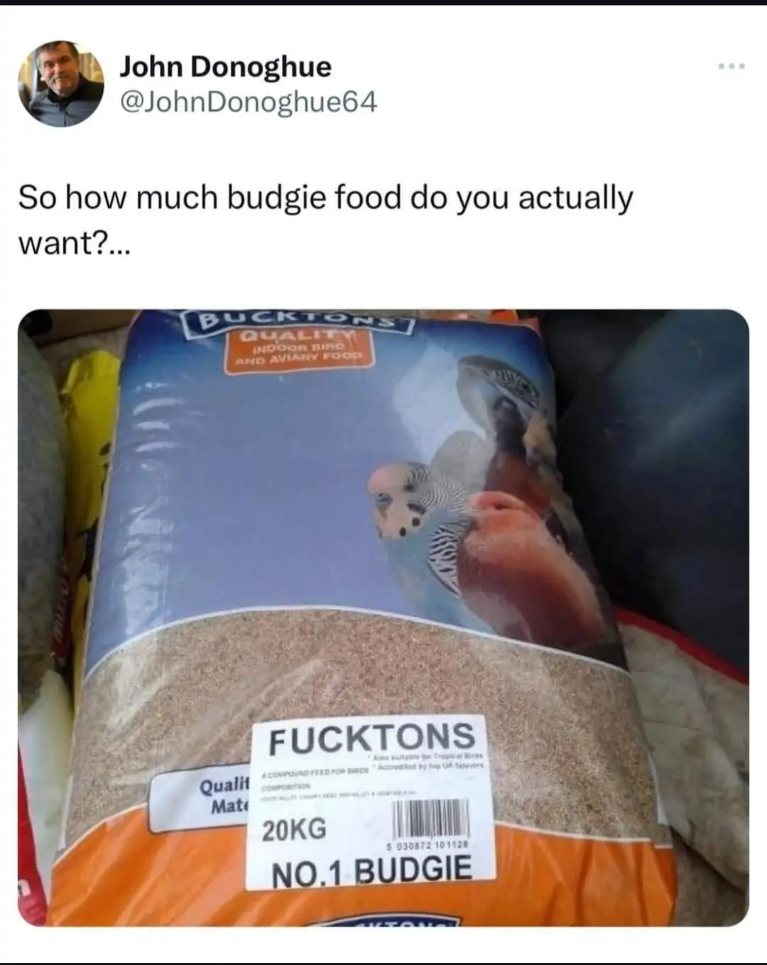A large 20kg bag of bird food labeled 'BUCKTONS QUALITY INDOOR BIRD AND AVIARY FOOD' with a picture of budgies. A white…