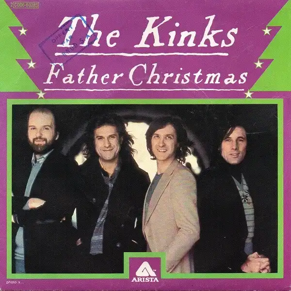 An album cover for 'Father Christmas' by The Kinks, featuring a photo of the four band members smiling and posing together…