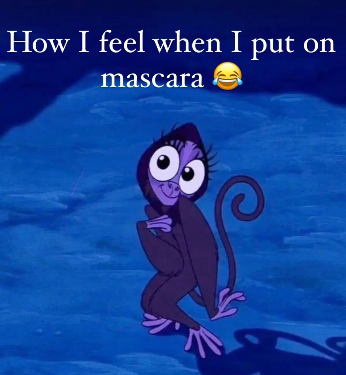 A cartoon monkey with exaggeratedly long eyelashes and wide eyes sits confidently on a blue surface, overlaid with the text…