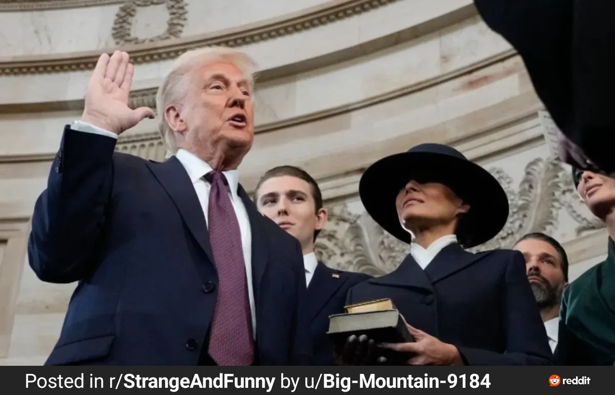 A low-angle photo shows Donald Trump raising his right hand while swearing an oath, with Melania Trump standing beside him…