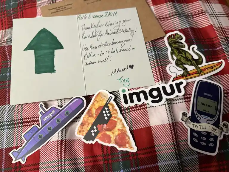 A handwritten note addressed to 'License 2Ki1t' thanks them for National Sticker Day and encourages using the included…