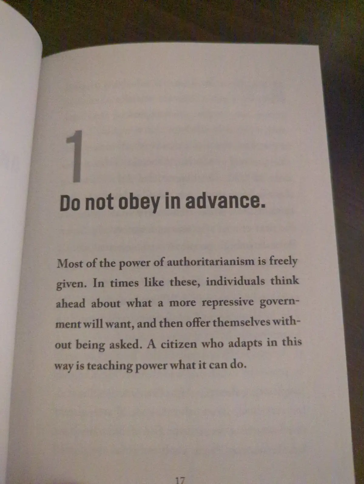 A close-up photo of a book page showing the number 1 and the bolded text 'Do not obey in advance.' followed by a paragraph…