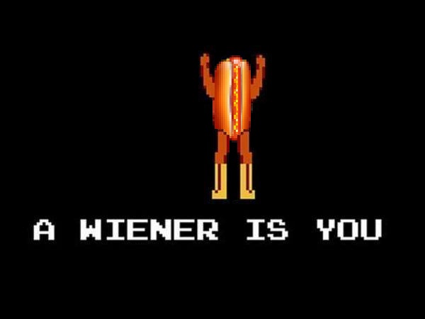 A pixelated, retro video game-style image shows a humanoid figure made entirely of a hot dog with mustard, standing with…