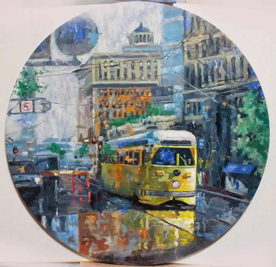 A circular painting depicts a rainy city street with a yellow tram, wet pavement reflections, and buildings under a cloudy…
