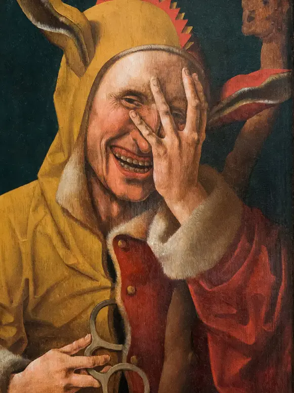 A classical painting depicts a man in a yellow hooded outfit with rabbit ears and a red garment, laughing hysterically while…