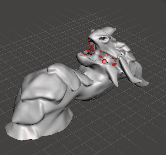 a grayscale 3d digital model of a dragon lying on a grid background, with red dots and a red sphere overlaid on its face…