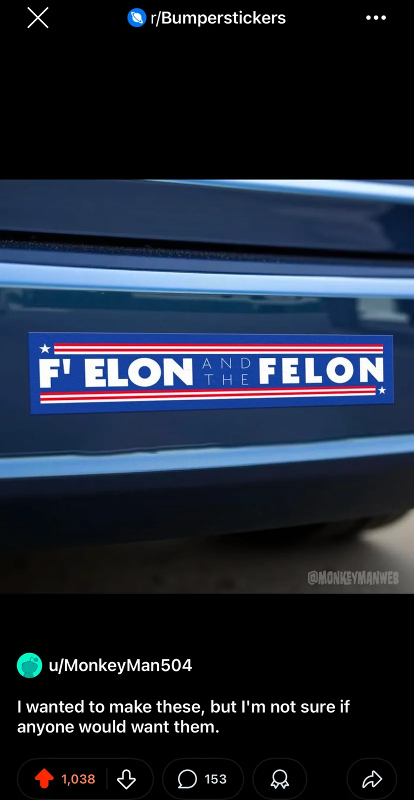 A close-up photo shows a blue bumper sticker on a dark blue car, featuring red and white stripes and stars, with the text…