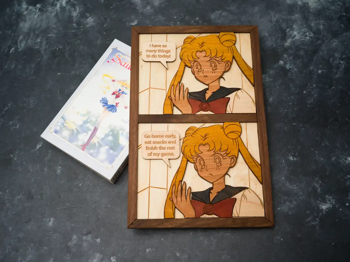 A wooden, stained-glass-style framed artwork depicts Sailor Moon in two panels. In the top panel, she says, 'I have so many…