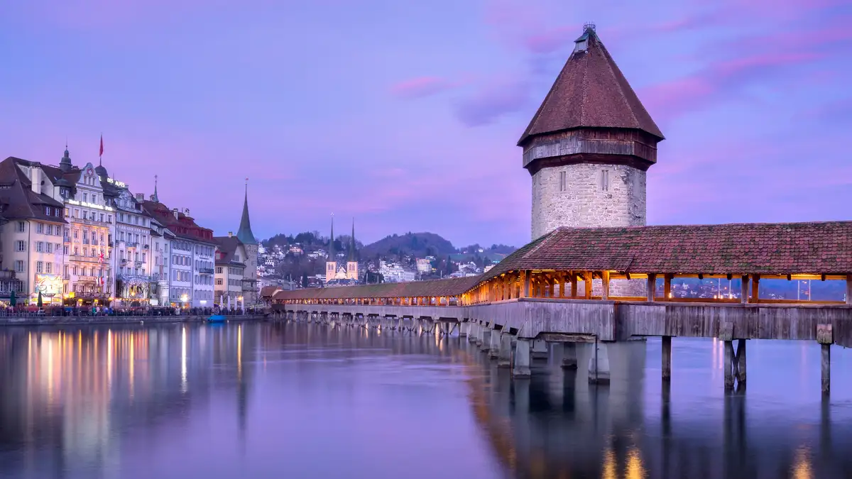 In central Switzerland, Lucerne's revered KapellbrÃÂ¼cke, dating back to 1395, is Europe's oldest covered wooden bridge and…