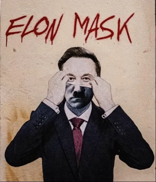 A man in a dark suit and red tie is shown holding a white strip across his eyes, resembling a mask. The image has a…