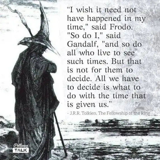A black-and-white illustration shows a cloaked figure in a pointed wizard hat, holding a staff, standing on a rocky shore…