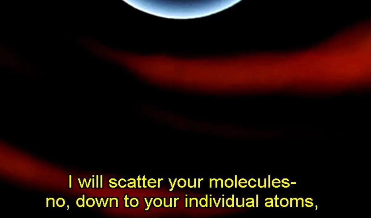A dark, cosmic image with a glowing blue planet at the top and red nebula-like clouds below. Yellow text overlaid at the…