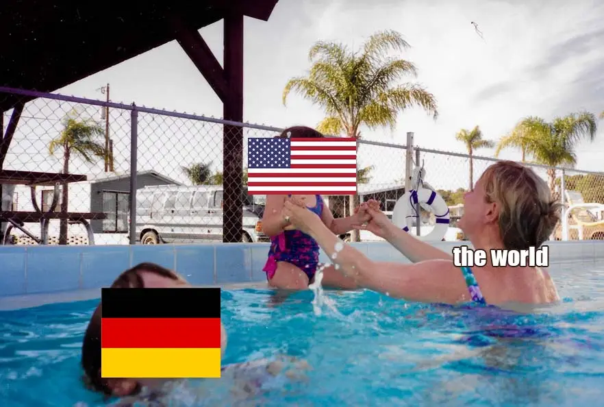 A woman and a child are in a swimming pool, with the child's face obscured by an American flag and the woman's face obscured…