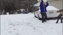 A sequence of six images shows a person in a blue jacket throwing snowballs at another person in a red jacket who is running…