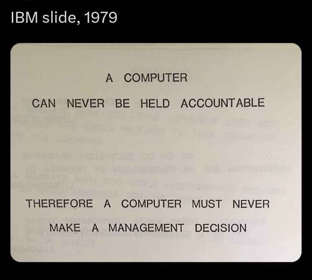 An old IBM presentation slide from 1979 displays text in a typewriter-style font, stating that a computer can never be held…