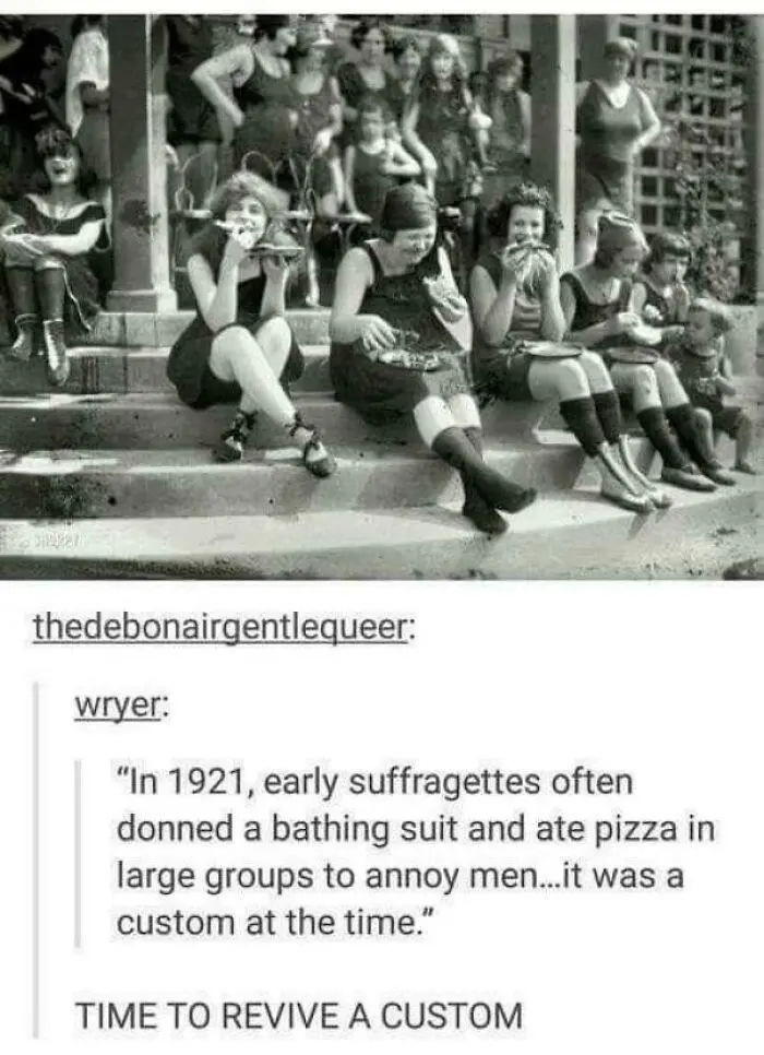A black-and-white historical photo shows a group of women in 1920s bathing suits sitting on stone steps eating pizza. The…