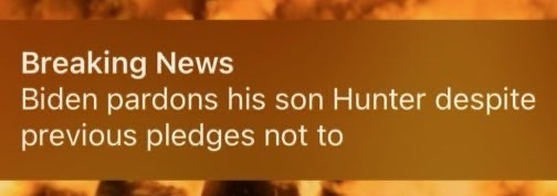 A news-style banner with a fiery orange background and white text reads 'Breaking News' followed by 'Biden pardons his son…