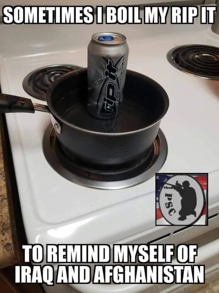 A silver 'Rip It' energy drink can is standing upright in a small black saucepan filled with water, which is placed on a…