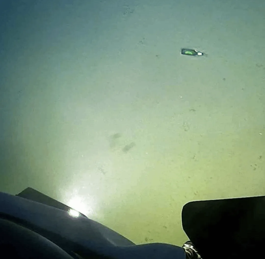 A beer bottle's journey to the depths of Challenger Deep