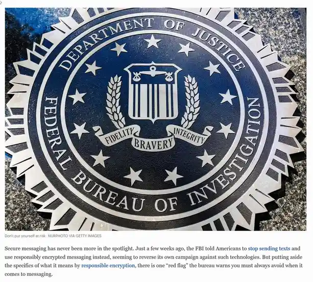 The image shows a close-up of the official seal of the Federal Bureau of Investigation, mounted on a granite surface. The…
