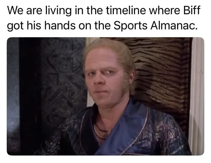 A still image of the character Biff Tannen from the 'Back to the Future' film series, shown with a smug, self-satisfied…