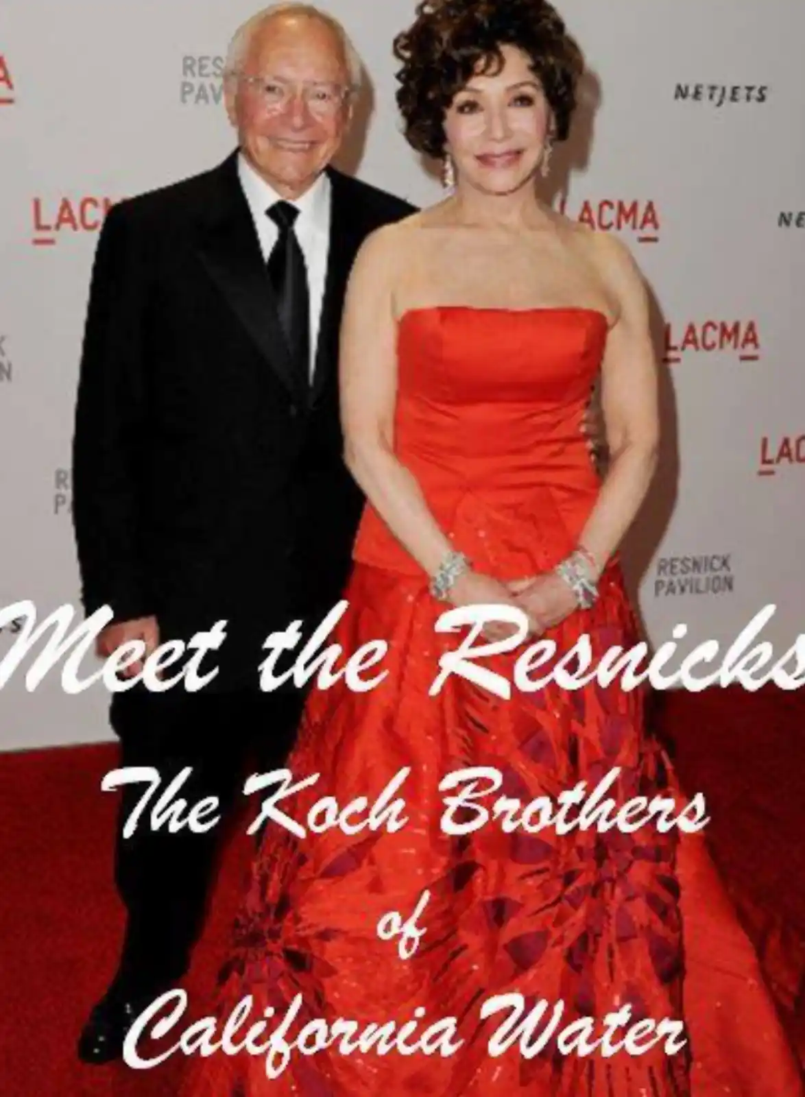 An older man and woman pose together on a red carpet in front of a backdrop with 'LACMA' and 'RESNICK PAVILION' logos. The…