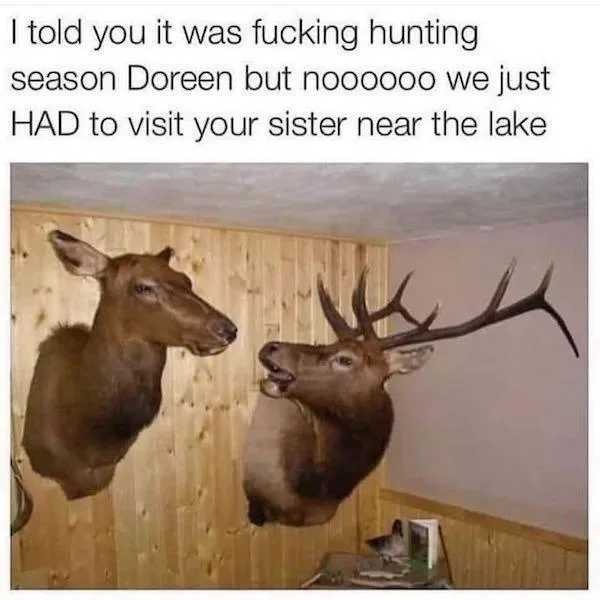 Two taxidermied deer heads mounted on a wood-paneled wall appear to be having an argument, with the male deer's mouth open…