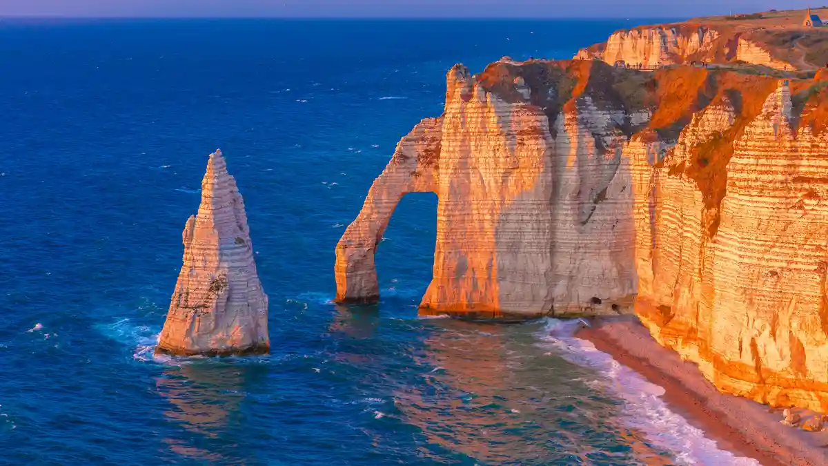 A unique seascape on the Alabaster Coast of the English Channel, where stripes of flint in chalk cliffs resemble an…