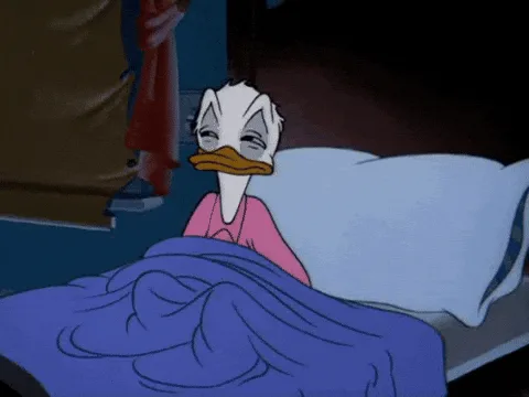A sequence of six panels shows a cartoon duck in bed, initially peeking out from under a blue blanket with a tired…