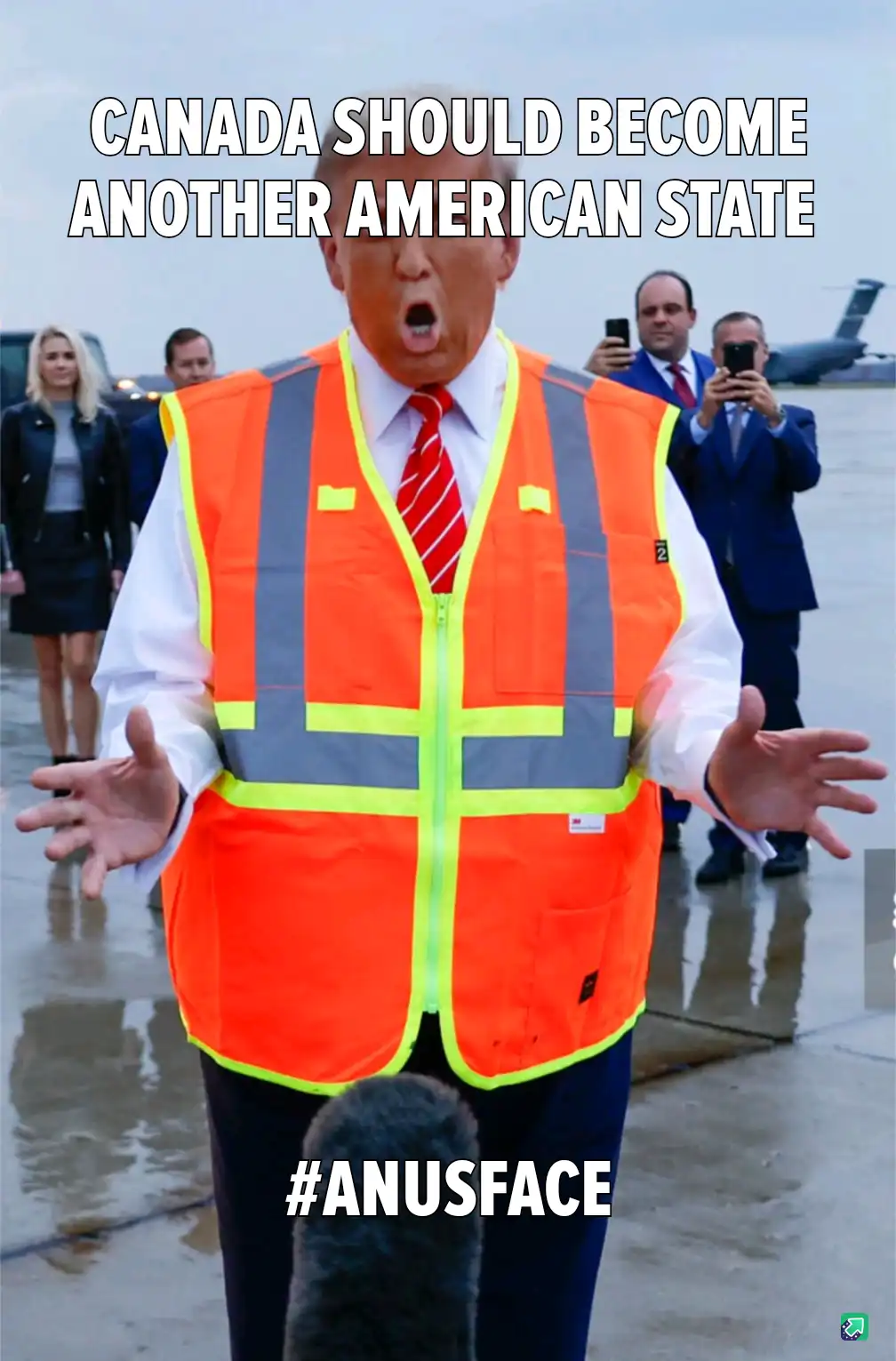 A man in an orange safety vest with a red tie and white shirt stands with his mouth open and hands outstretched, as if…