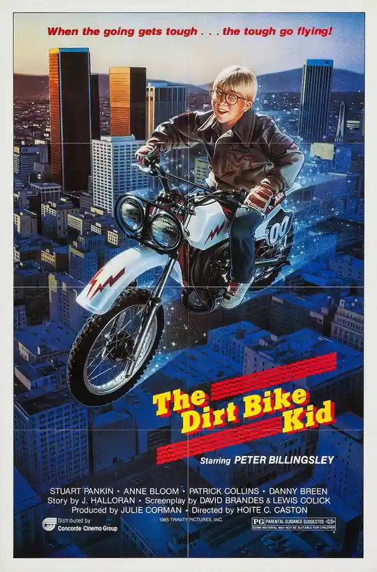 A vintage movie poster for 'The Dirt Bike Kid' (1985) shows a young boy with glasses riding a white dirt bike high above a…