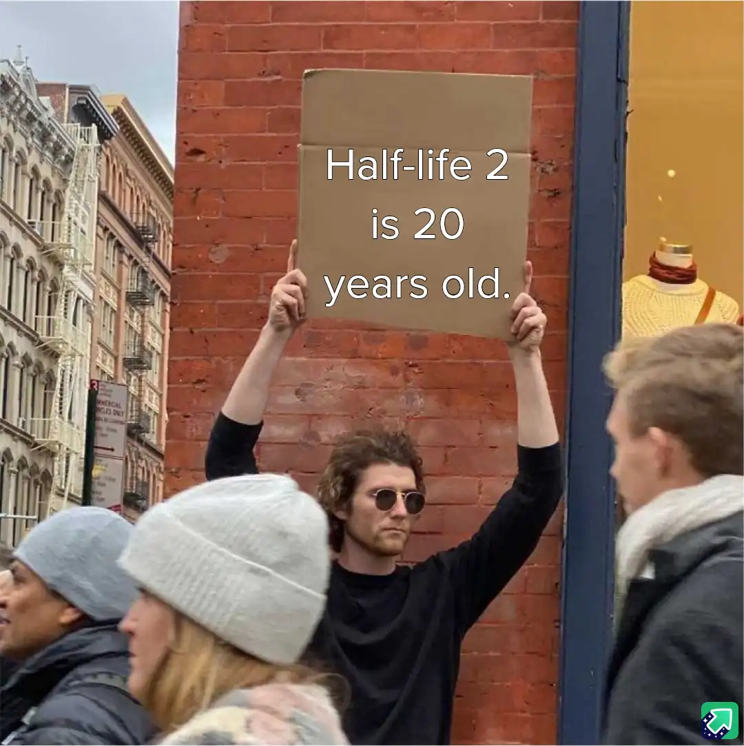 A man with curly hair and sunglasses holds up a cardboard sign in a city street, with the text 'Half-life 2 is 20 years…