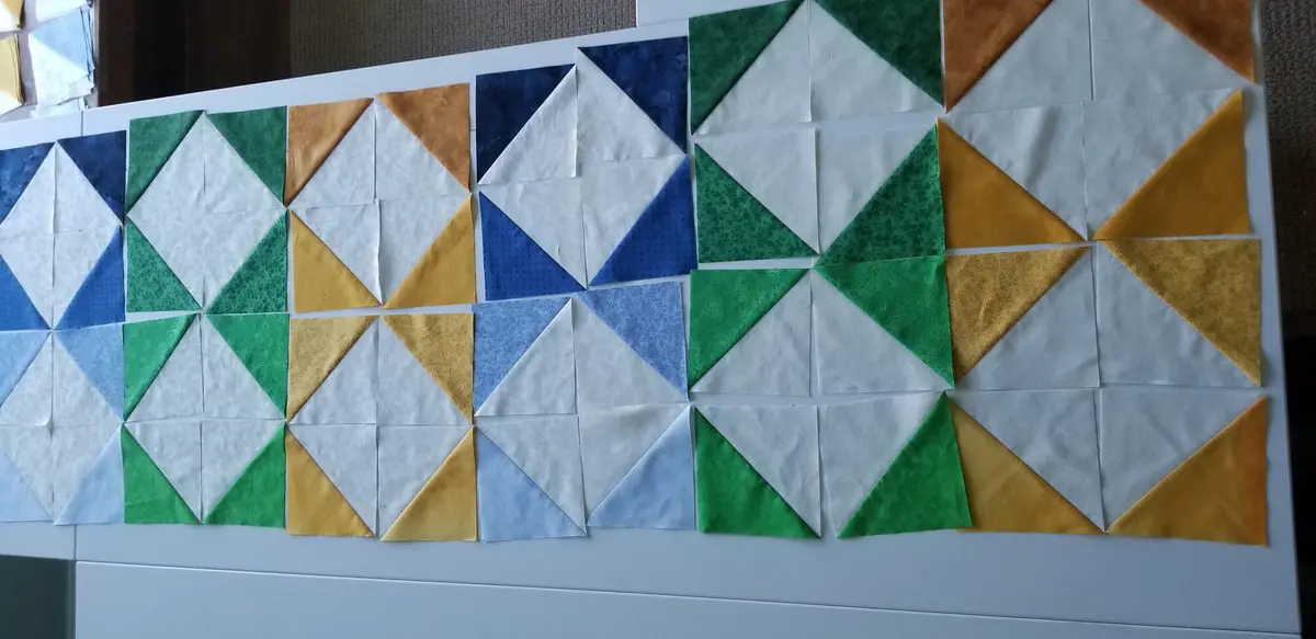 Seeking Opinions on My HST Quilt Layout Play