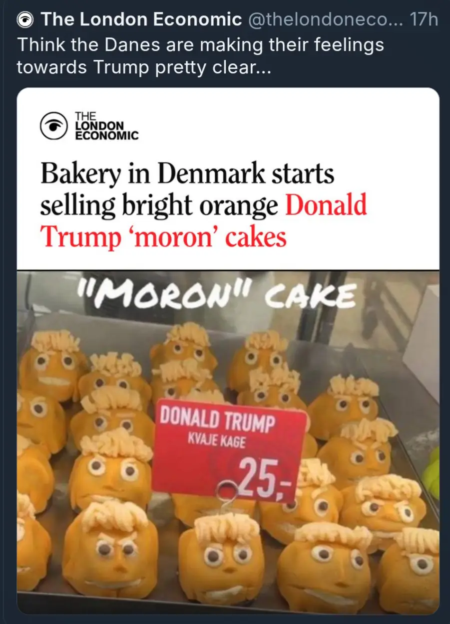 A screenshot of a tweet from The London Economic shows a bakery display of bright orange cakes shaped like Donald Trump's…