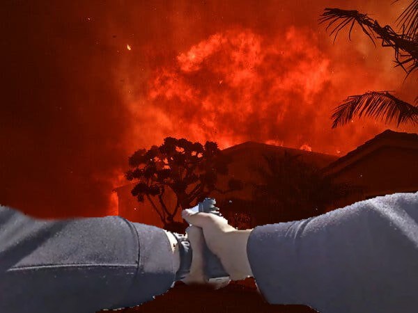 Two hands in blue sleeves shake in front of a house engulfed in a massive red-orange wildfire, with palm trees silhouetted…