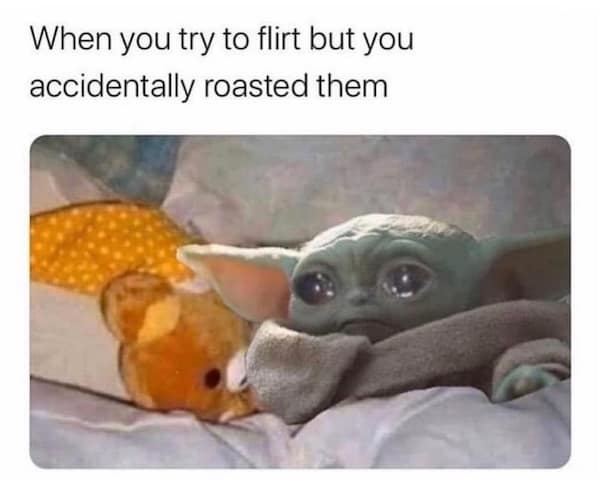A close-up image of the character Grogu (Baby Yoda) lying in bed, looking sad and wide-eyed with a slightly downturned…