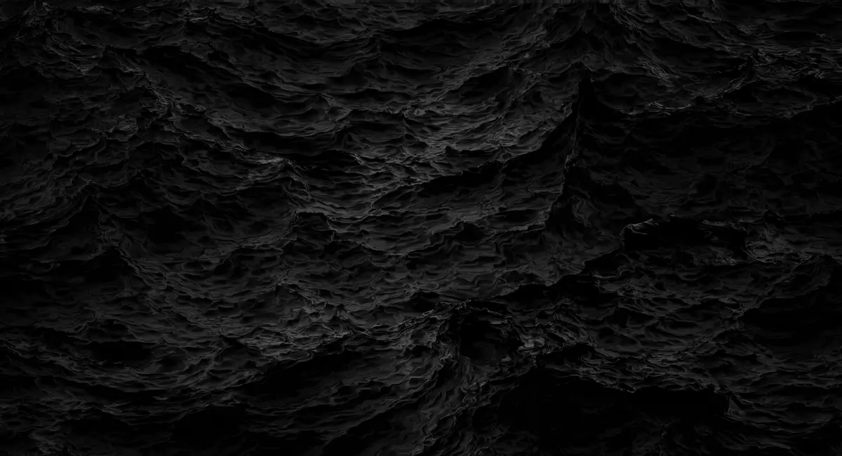 A dark, textured image of churning black water with no visible figures or objects. Overlaid white text reads 'i'm not…