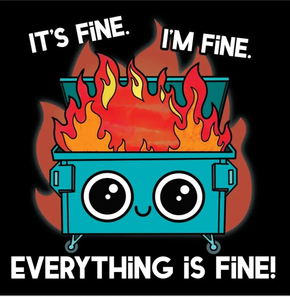 A cartoonish blue dumpster with large, innocent eyes and a small smile is engulfed in bright orange and red flames. The text…