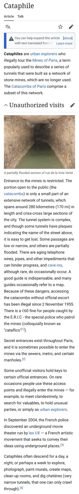 The image shows a screenshot of a Wikipedia article about 'Cataphiles,' featuring a photo of a dark, flooded underground…
