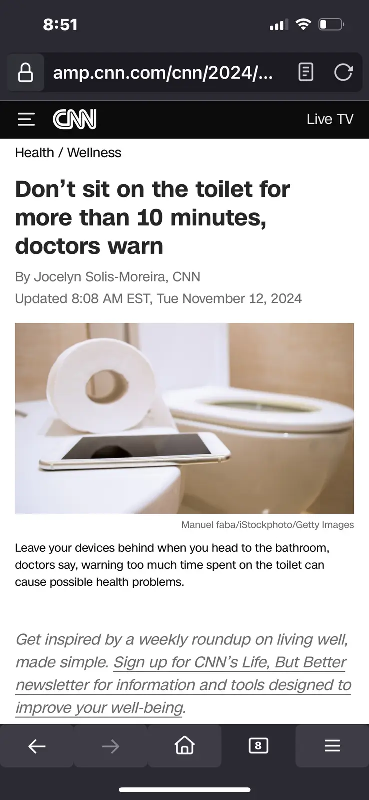 A screenshot of a CNN mobile news article titled 'Don't sit on the toilet for more than 10 minutes, doctors warn' shows a…