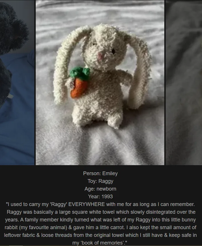 A close-up photo of a small, handmade, fluffy white bunny rabbit toy holding a tiny carrot. The toy appears to be made from…