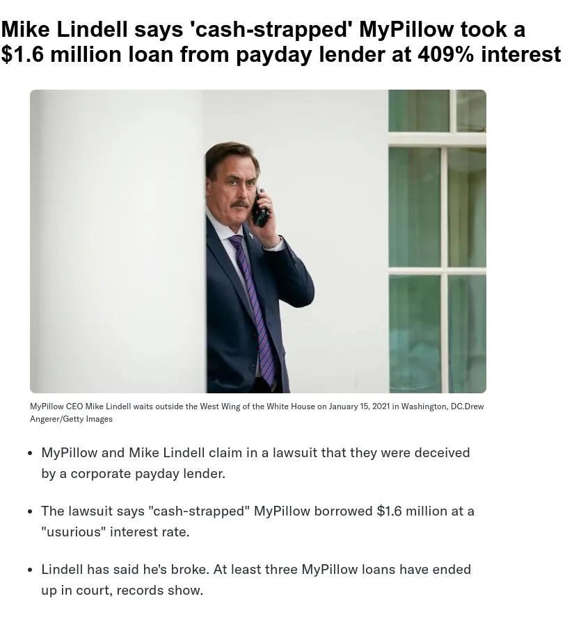 A man in a dark suit and striped tie peeks from behind a white pillar while holding a phone to his ear, looking concerned…
