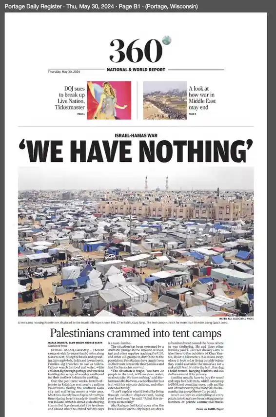 A newspaper clipping from the Portage Daily Register dated May 30, 2024, shows a large photo of a sprawling tent city in…