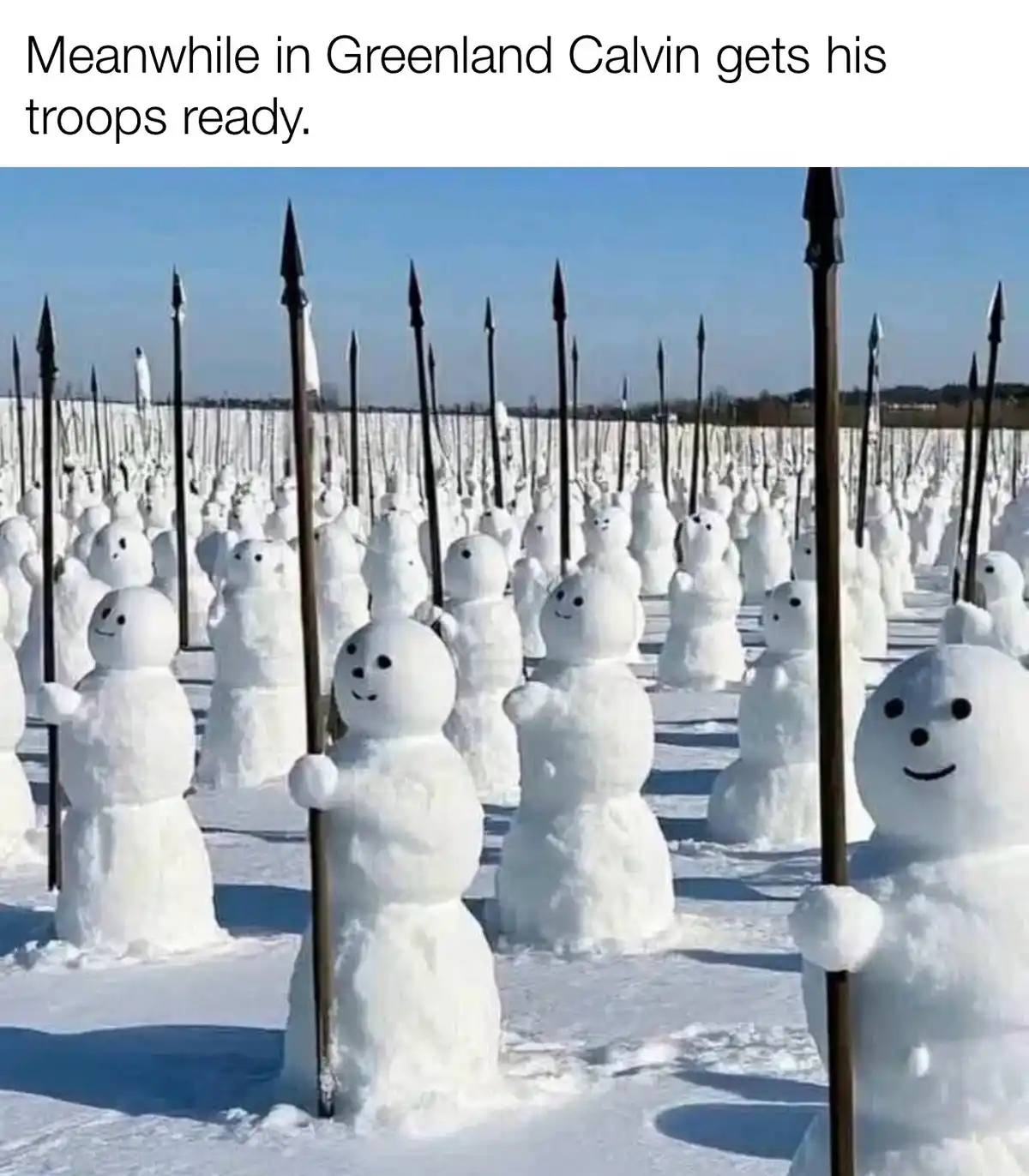 The image shows a vast snowy field filled with hundreds of snowmen arranged in neat rows, each holding a long spear with a…