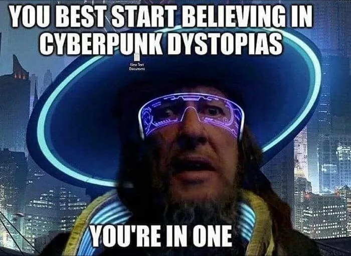 A man with a beard and futuristic purple-lit glasses, wearing a wide-brimmed hat, stares intensely at the viewer against a…