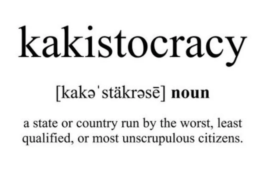 The image displays a dictionary-style definition for the word 'kakistocracy,' presented in black serif font on a white…