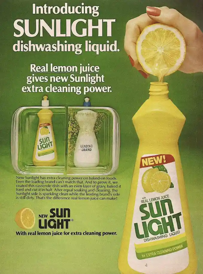 A vintage Sunlight dish soap advertisement shows a hand squeezing lemon juice into a yellow bottle labeled 'NEW! SUNLIGHT…
